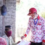 Cair! BLT Mulai Disalurkan, Perdana Bupati Iskandar Kamaru Serahkan di Desa Dudepo